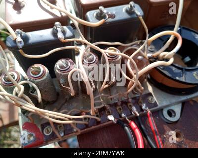 Acoustic filter - crossover, Amphiton 35AC-018 vintage acoustic system. Capacitors and coils on the circuit board. Stock Photo