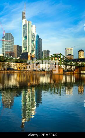Early morning view of central Frankfurt am Main and th Eiserner Steg from across the river Main. Stock Photo
