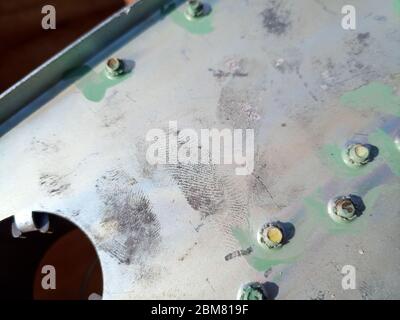 Fingerprints on the steel surface. Fingerprints of dirty hands. Stock Photo