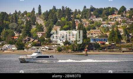 SEATTLE, WASHINGTON STATE, USA - JUNE 2018: High speed passenger ferry crossing Elliott Bay to Seattle. Stock Photo