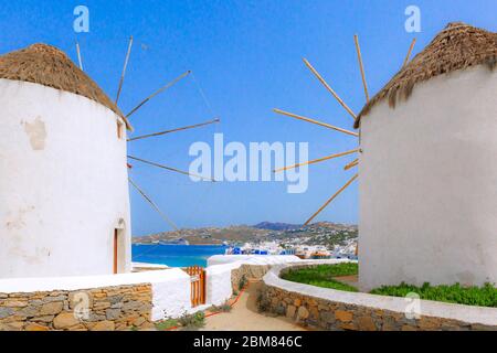 Mykonos, Greece, greek iconic windmills and little venice panorama in famous island Stock Photo