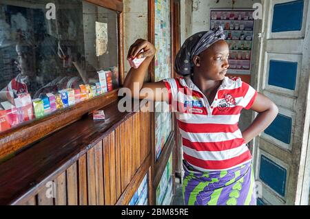 Because she’s unmarried, Dorcas Amuri, a 28-year-old businesswoman, was denied access to contraception at a hospital. After buying pills labeled as contraceptives from several local pharmacies in Kisangani, Democratic Republic of Congo, she suffered cramps and diarrhea. (Françoise Mbuyi, GPJ DRC) Stock Photo