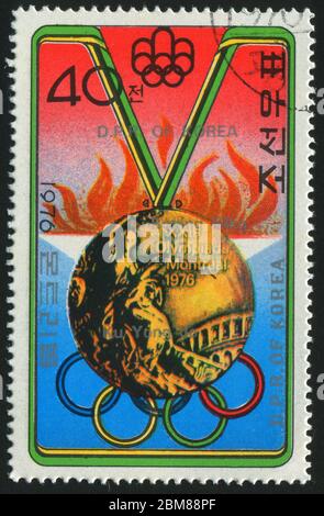 KOREA - CIRCA 1976: stamp printed by Korea,  shows olympic medal, circa 1976. Stock Photo