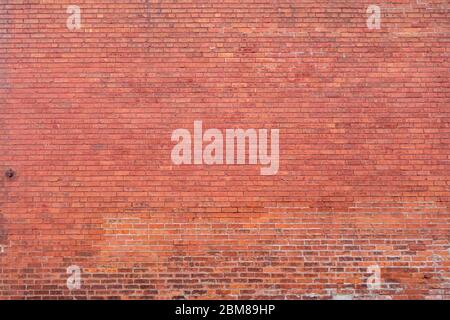 distant wide angle image of a red brick wall Stock Photo