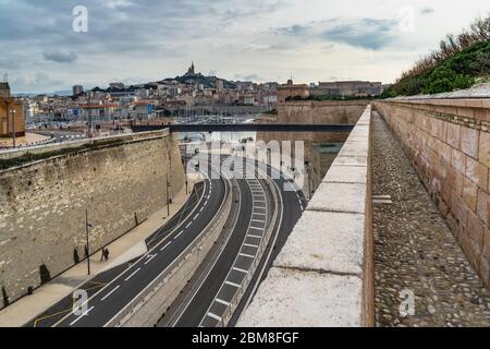 The scenic walkway on the exterior walls of the Fort Saint-Jean overlooking Marseille Old Port, France Stock Photo