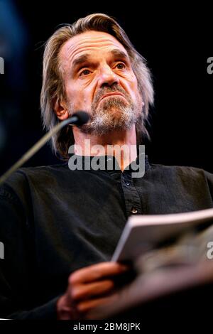 Jeremy Irons reading poetry of The Great War on stage at Hay Festival 2013 Hay on Wye Powys Wales UK ©PRWPhotography Stock Photo