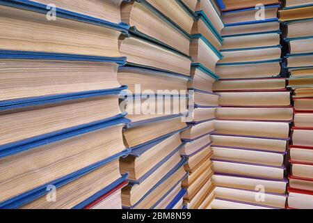 Old textured books pile close up. Wide angle view Stock Photo