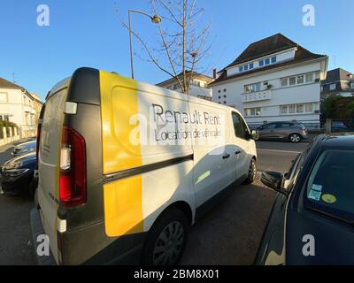 Paris, France - Feb 8, 2020: Rear view of Renault rent white van parked on French street Stock Photo