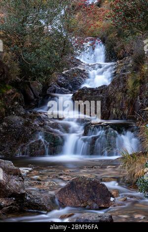 Waterfall on the Afon Goch in autumn, Nant Gwynant, Snowdonia National Park, North Wales, UK Stock Photo