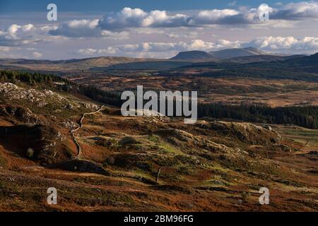 Distant Cadair Idris from the summit of Crimpiau in autumn, Snowdonia National Park, North Wales, UK Stock Photo
