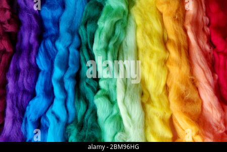 Merino wool colorful dyed textile long hanging strands Stock Photo