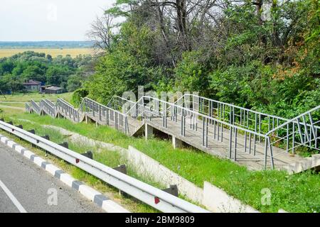 pedestrian staircase for pedestrians on the bridge. Stock Photo