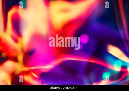 Abstract saturated retro wallpaper of digital colorful futuristic conceptual organic alien shape with purple space void background Stock Photo