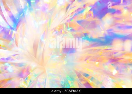 Beautiful abstract blurred smooth magical background of shiny glamorous Christmas holographic party foil ribbon with gentle delicate light reflections Stock Photo