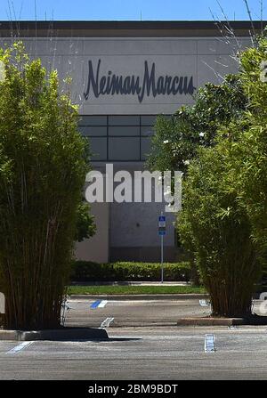 Orlando, United States. 07th May, 2020. An empty parking lot is seen at the Neiman Marcus store at the Mall at Millenia on the day the company filed Chapter 11 bankruptcy. The luxury retailer is the first major department store group to file for bankruptcy protection during the coronavirus pandemic. Credit: SOPA Images Limited/Alamy Live News Stock Photo