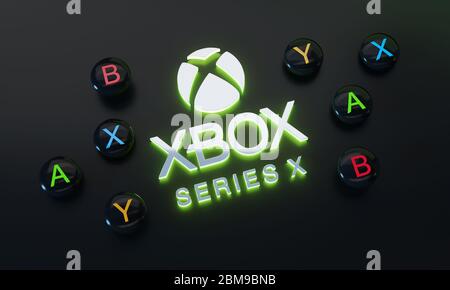 Xbox Series X Logo Glow Around Joystick Button on Dark Background Stock Photo