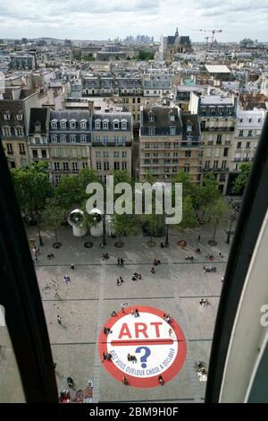 The view of Place Georges Pompidou square in front of Pompidou Centre building with cityscape of Paris in the background.Paris.France