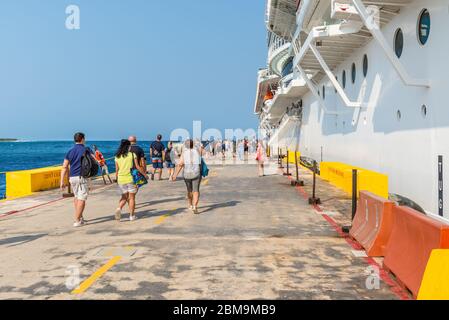 Costa Maya, Mexico - April 25, 2019: Cruise Ship MSC Seaside docked in the port of Costa Maya with passengers going to the embarkation at Costa Maya. Stock Photo