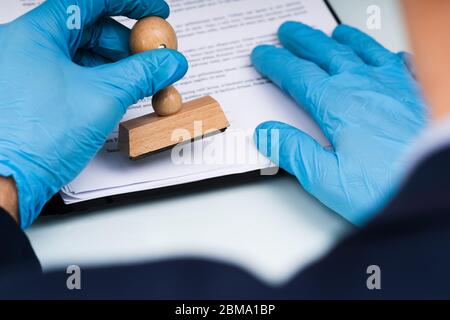 Approved Stamper On Record Or Permit Document Stock Photo