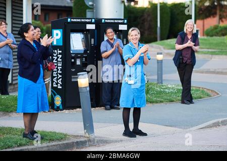 Rugby, Warwickshire, 7th May 2020. Weekly appreciation for NHS nurses, carers and key workers at 8pm on Thursdays. Hospital staff of Rugby St Cross Stock Photo