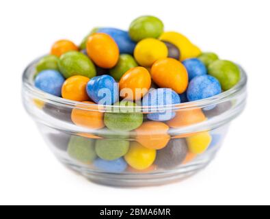 Chocolate coated peanuts isolated on white background (selective focus) Stock Photo