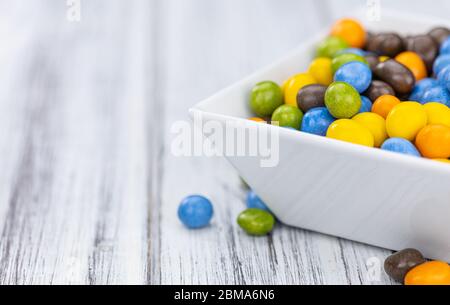 Chocolate coated peanuts as detailed close up shot (selective focus) Stock Photo