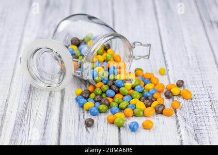 Chocolate coated peanuts as detailed close up shot (selective focus) Stock Photo