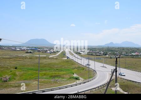 The road crossing is adjacent to the secondary road. Stock Photo