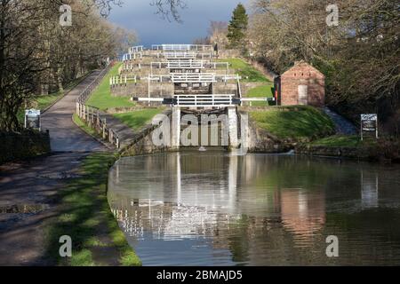 Five Rise locks on the Leeds and Liverpool Canal near Bingley, West Yorkshire Stock Photo
