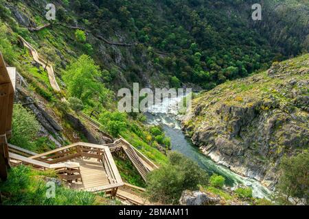 Arouca, Portugal - April 28, 2019: Beautiful landscape of the Paiva River, in Portugal, with a part of the river with its rapids and the Paiva walkway Stock Photo