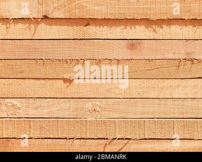 Stack of lumber boards background or texture concept Stock Photo