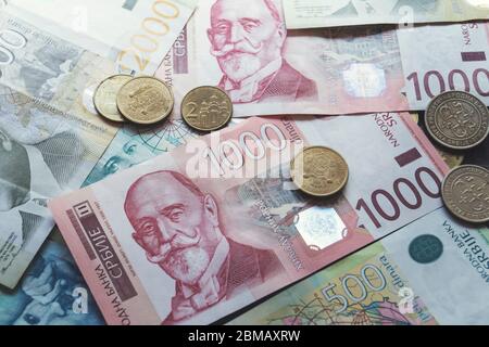 Serbian money dinar, pile of coins on wooden table, top view Stock Photo