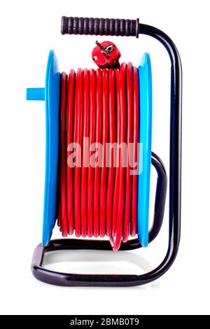 The Electric extension reel, red Rubber gloves Isolated on white background. Stock Photo