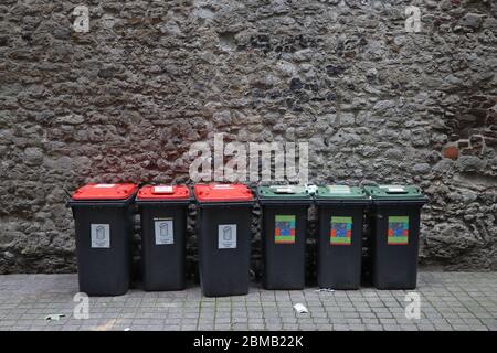 LONDON, UK - JULY 13, 2019: Mixed household waste and household recycling sorted garbage bins in London UK.  London is the most populous city and metr Stock Photo