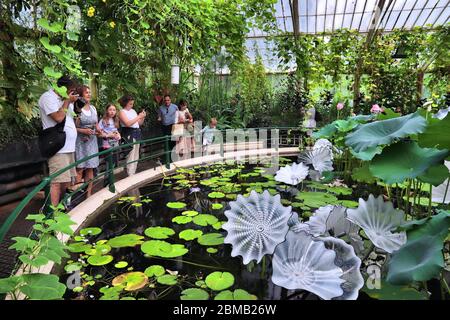 KEW, UK - JULY 15, 2019: People visit Waterlily House of Kew Gardens in Greater London. Royal Botanic Gardens are designated as UNESCO World Heritage Stock Photo