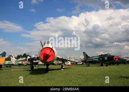 Exterior view of a Sukhoi Su-17UM 'Fitter-E' (combat trainer) and a Su-20 'Fitter-C' (export version) at the Zhulyany State Aviation Museum of Ukraine Stock Photo