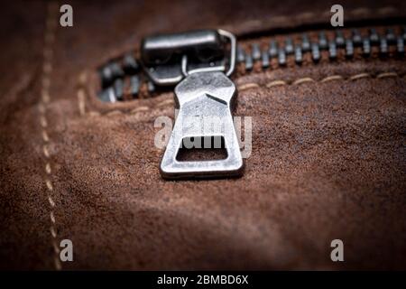 zip fastener on a brown leather motorcycle jacket Stock Photo