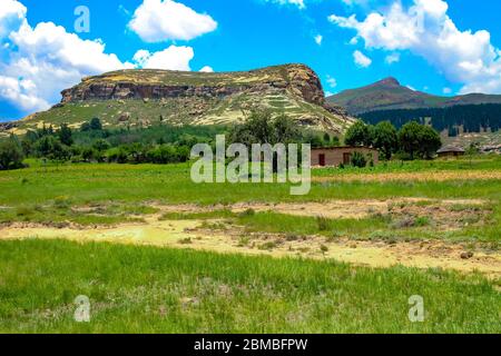 Small village and Drakensberg mountain landscape in Lesotho, Southern Africa. Stock Photo