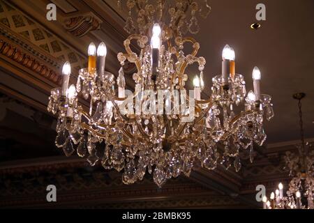 The lights and the reflections of a glass chandelier Stock Photo