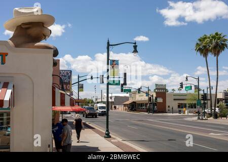 Street view of downtown Gilbert Arizona Liberty Market and palm trees ...