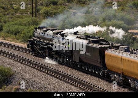 Union Pacific steam engine number 4014 going away from view close up Stock Photo