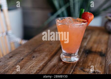 Orange Cocktail on Wood Table Stock Photo
