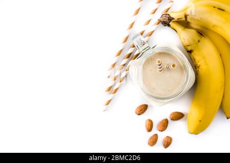 Banana smoothie with almond in jar isolated on white background Stock Photo