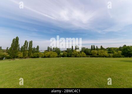 Gloucester Park, Basildon, Essex, UK. Large green space park with lakes. Sunny spring day. Urban neighbourhood park named after the Duke of Gloucester Stock Photo