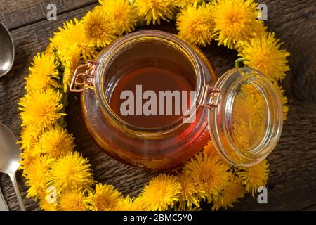 Dandelion honey - a syrup made from sugar and fresh Taraxacum flowers Stock Photo