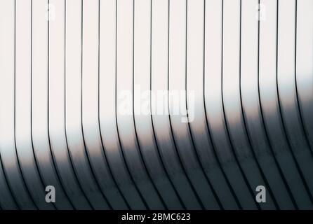 gray curved wall of a modern building monochrome abstract architectural background pattern Stock Photo