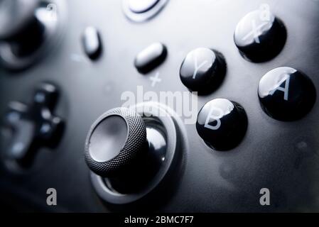 Black modern controller with black buttons Stock Photo