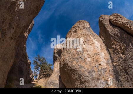 34.9 million years ago, a huge volcano eruption deposited the rock that became Kneeling Nun Tuff, which forms the pinnacles of City of Rocks State Par Stock Photo