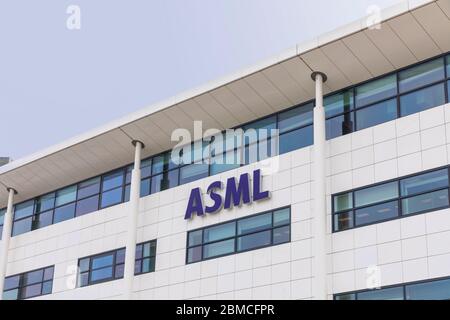 Veldhoven, The Netherlands, May 8th 2020. ASML company  logo on the building with its exterior facade. The Dutch company business is the world’s suppl Stock Photo