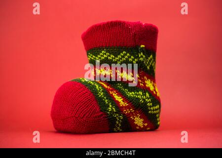 Christmas knitted gift sock Stock Photo